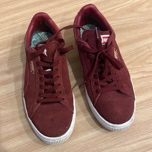 Red suede puma sneakers